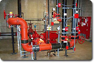 A large red industrial fire pump system